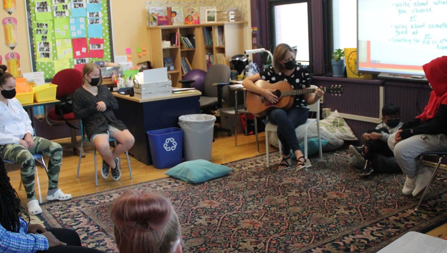 Teacher Playing to the Class